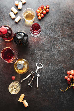 Wine tasting set with various sorts of wine, overhead view, copy space for a textの写真素材