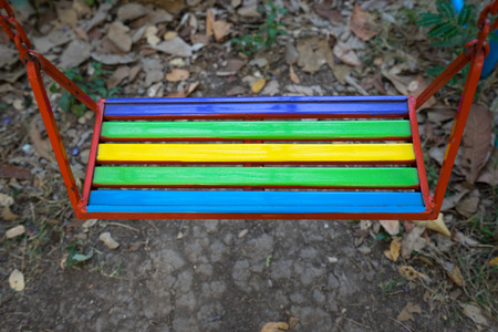 Multi-colored swing seats