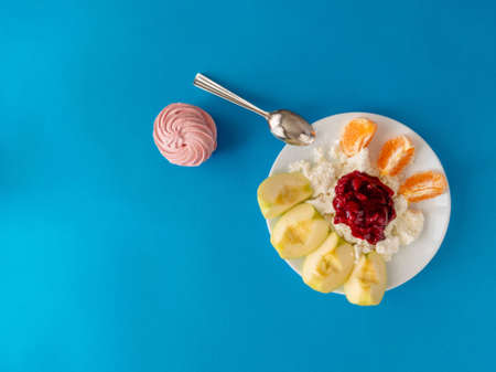 cottage cheese with jam and fruitの写真素材