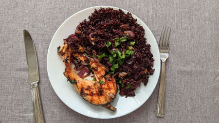 Rice with salmon in a plate on the tableの写真素材