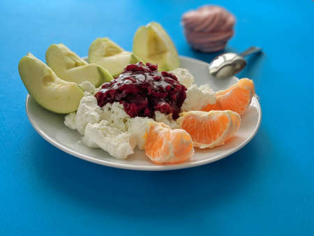 cottage cheese with jam and fruitの写真素材