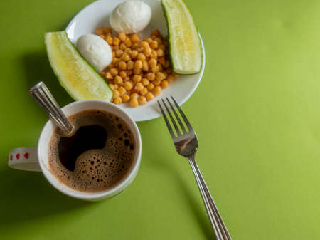 breakfast, chickpeas, eggs, cucumber, coffeeの写真素材