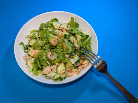 green salad with shrimp and tunaの写真素材