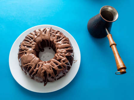 chocolate muffin cake on a plateの写真素材