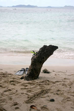 diving equipment on the beachの写真素材