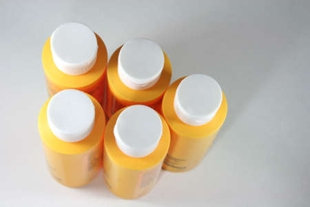 yellow plastic bottles packaging conceptsの写真素材