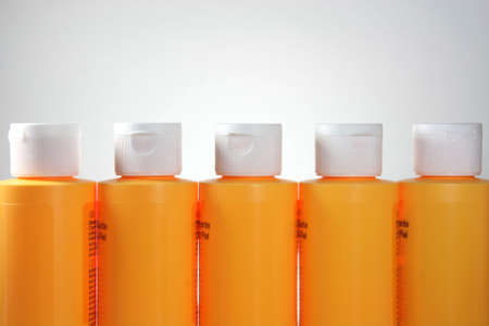 yellow plastic bottles packaging conceptsの写真素材