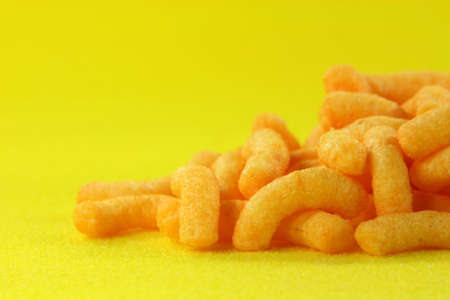 potato snacks with yellow background food conceptsの写真素材