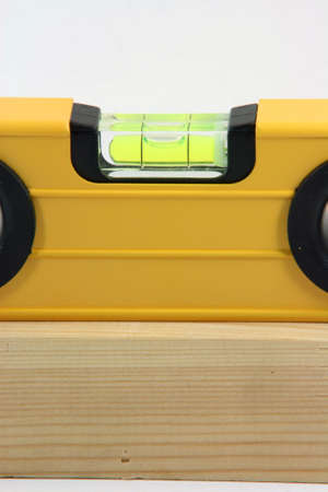 alignment construction concepts working with wood detail in white backgroundの写真素材