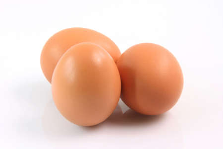 three fresh brown eggs isolated on white background food and agriculture concepts