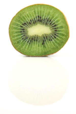 half kiwi fruit with reflection isolated on white background healthy eating and agriculture conceptsの写真素材