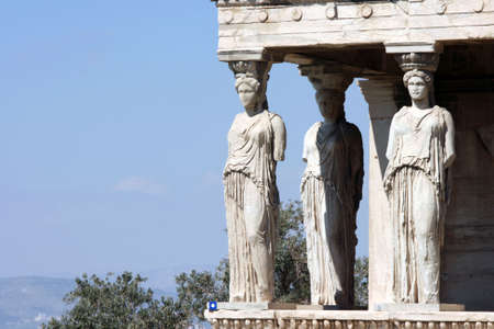 caryatids and nature at Erechtheum on Parthenon in Athens, Greeceの写真素材
