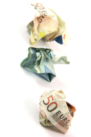 crumpled euro banknotes isolated on white background business and finance conceptsの写真素材