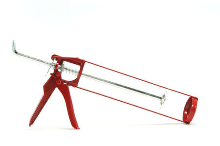 silicone gun isolated on white background construction industry toolsの写真素材