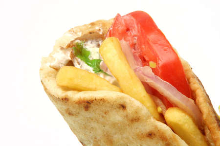 traditional greek food gyros kebap detail isolated on white backgroundの写真素材