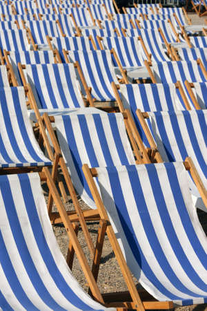 blue and white chaise longues texture and tables summer concepts