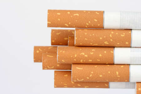 cigarette filters closeup with copyspace isolated on whiteの写真素材