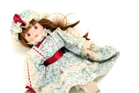 beautiful antique porcelain doll old fashioned on white backgroundの写真素材