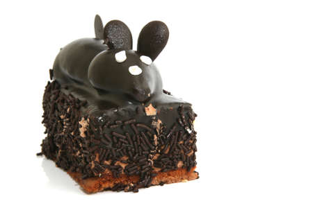 closeup chocolate mouse cream cake isolated on white backgroundの写真素材