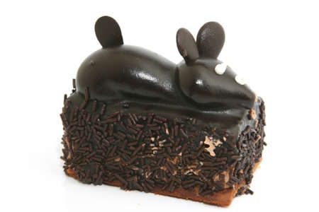 chocolate mouse cream cake isolated on white backgroundの写真素材