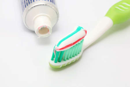 dental hygiene green toobrush and toothpaste detail