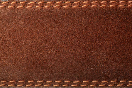 leather texture background with swing string up and down detail from beltの写真素材