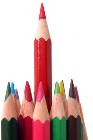 long red pencil and colorful pencils closeup detail isolated with copyspaceの写真素材