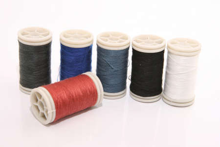 varius cotton sewing string isolated on white backgroundの写真素材