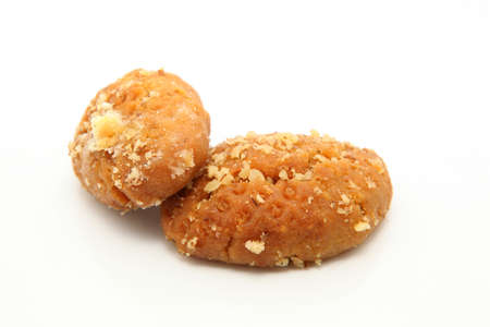 two traditional Greek Christmas sweets called melomakarona or phoenikia. A honey-dipped cookie, with wallnuts on topの写真素材