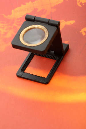 lithography and printing magnifaying glass on parer with copyspaceの写真素材
