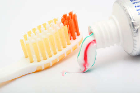 dental hygiene yellow toobrush and toothpaste detailの写真素材