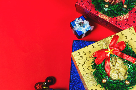 Merry colors gift boxes placed christmas on red background