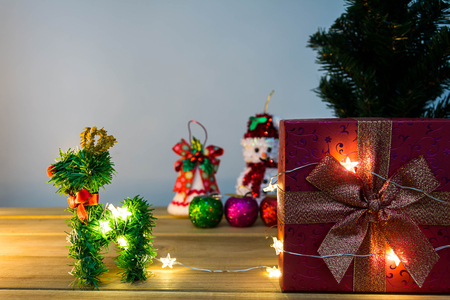 Merry Christmas and happy new year event on wood . Open Warm white lightの写真素材