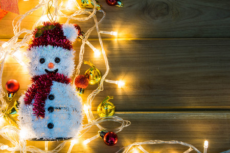 Merry Christmas and happy new year event on wood . Open Warm white lightの写真素材