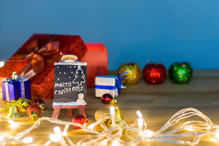 Merry Christmas and happy new year event on wood . Open Warm white lightの写真素材