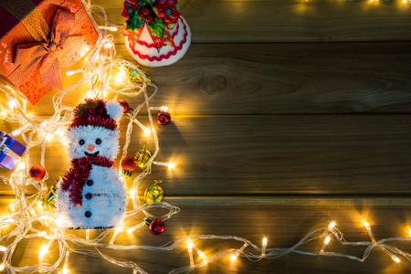 Merry Christmas and happy new year event on wood . Open Warm white lightの写真素材