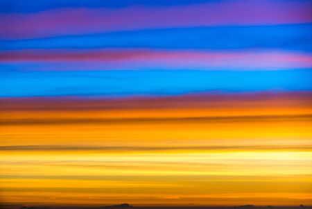 Clouds in the evening sky. Looking through the glass planeの写真素材