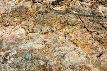 Old stone wall crack Background and textureの写真素材