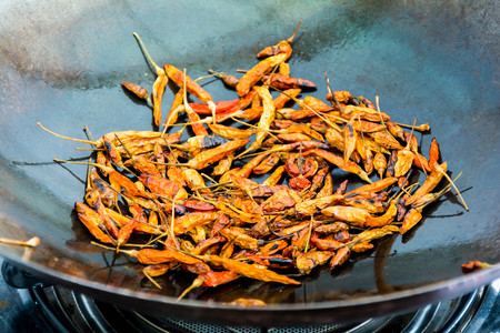 Peppers in a hot iron pan Food tasting eventの写真素材
