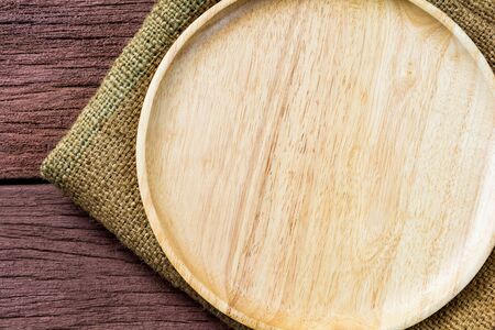 dish  on old wood table backgroundの写真素材