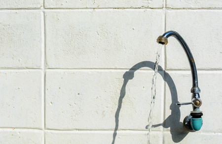 tap Outdoor cement background at homeの写真素材