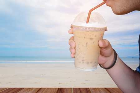 Drink coffee on vacation at the cafeの写真素材