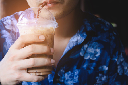 Drink coffee on vacation at the cafeの写真素材