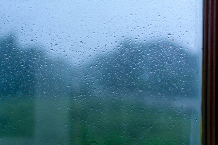 Droplet bokeh and rain on a glass background pattern and blur focusの写真素材