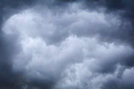 Dark sky with black clouds before rain on the air