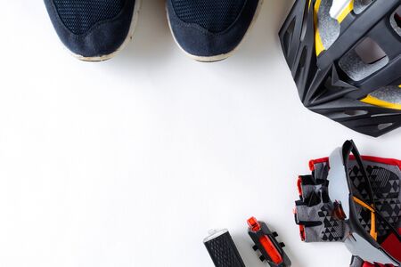 set bicycle equipment on a white paper background with healthy sportsの写真素材
