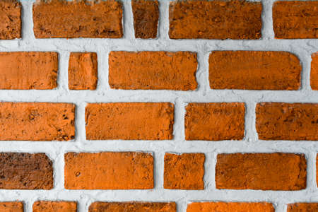 Mon brick wall pattern and texture background with buildingの写真素材