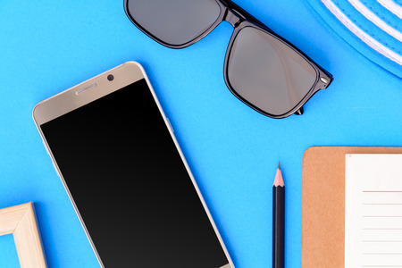 Wooden picture frame and set object vacation relax on colorful paper with travel and fashion styleの写真素材