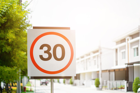 30 speed reduction sign with home community for safetyの写真素材