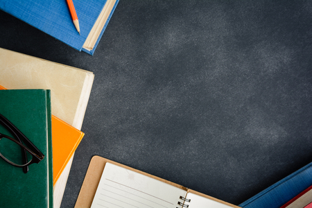 Book glasses and pencil on the desk with study and education conceptの写真素材